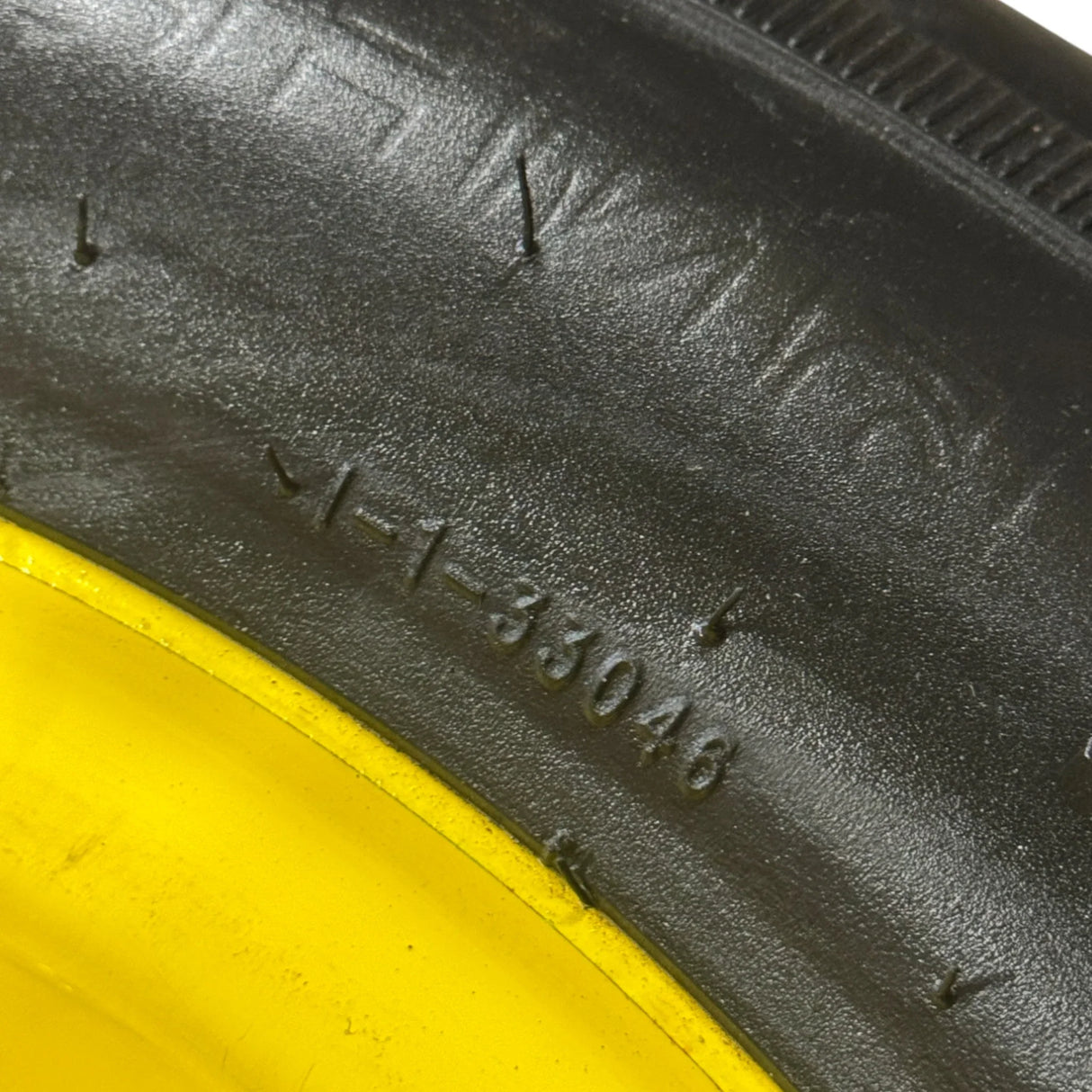 AW34779 Genuine John Deere Tire and Wheel Assembly 24 PR - Truck To Trailer